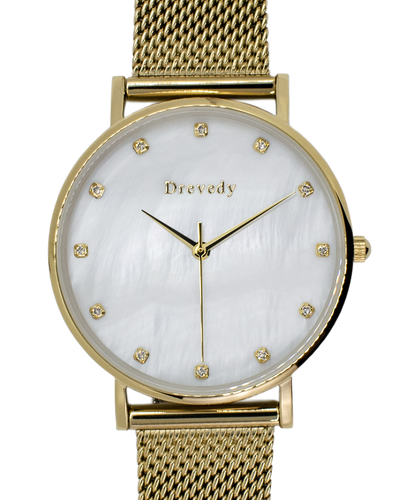 Gold watch. Pearl shell. Crystals. Mesh strap. Feminine. Classy.