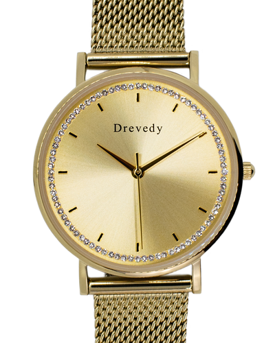 Gold watch. Pearl shell. Crystals. Mesh strap. Feminine. Classy.