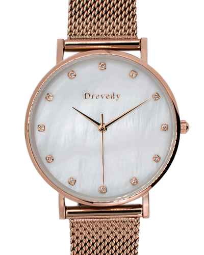 Rose gold watch. Pearl shell. Crystals. Mesh strap. Feminine. Classy.