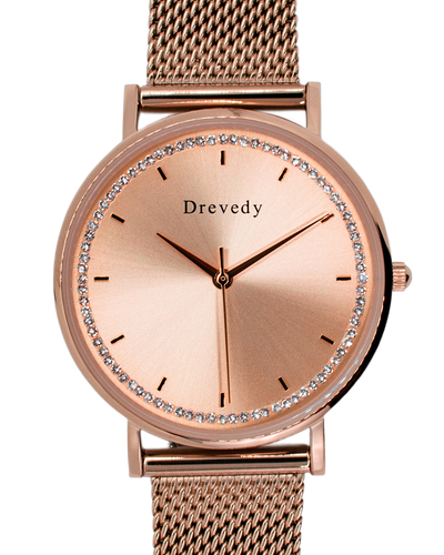 Rose gold watch. Pearl shell. Crystals. Mesh strap. Feminine. Classy.